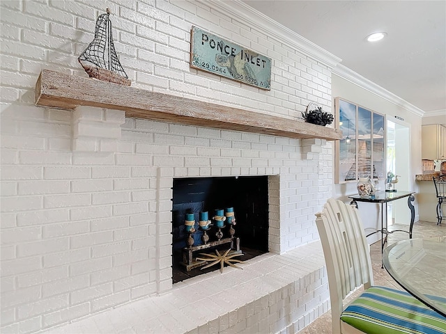 room details featuring a fireplace and crown molding