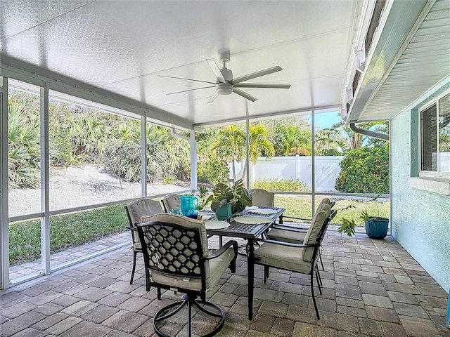 sunroom / solarium with ceiling fan