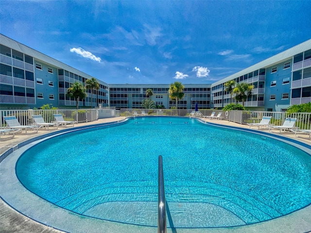 pool featuring fence