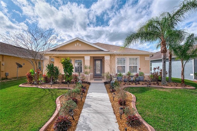 view of front of property with a front lawn and stucco siding