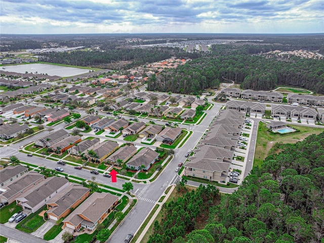 birds eye view of property with a residential view