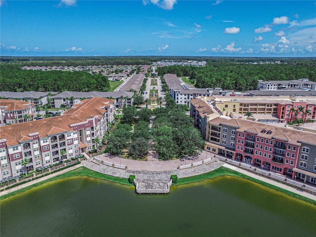 drone / aerial view with a water view