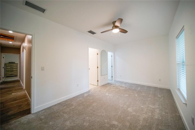 unfurnished bedroom with carpet flooring and ceiling fan