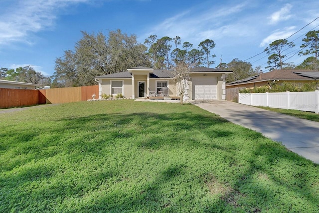 ranch-style home featuring stucco siding, concrete driveway, fence, a garage, and a front lawn