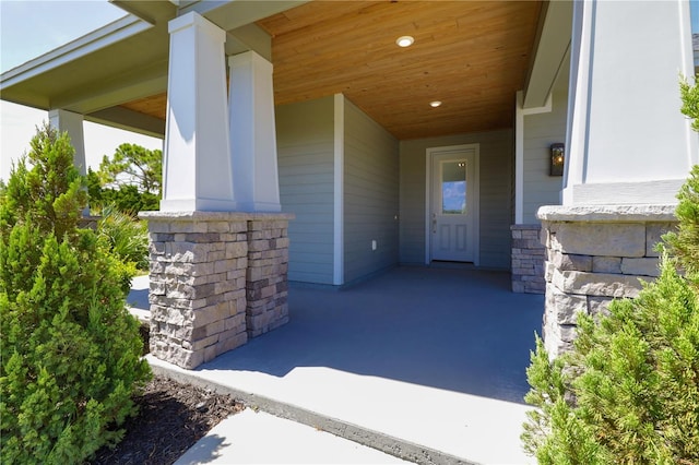 doorway to property featuring covered porch