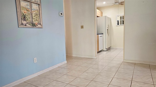 26 Birdie Dr, New Smyrna Beach, FL 32168 - hall featuring light tile patterned floors and baseboards