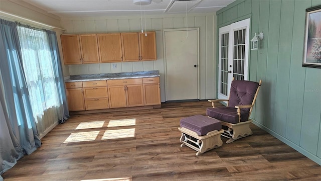 26 Birdie Dr, New Smyrna Beach, FL 32168 - kitchen with light countertops, light brown cabinetry, and wood finished floors