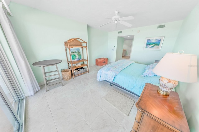 bedroom with light tile patterned flooring and ceiling fan