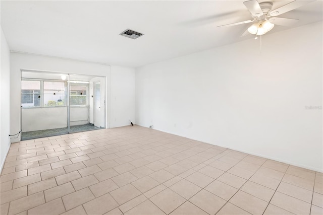 unfurnished room featuring ceiling fan