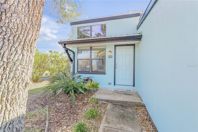 49 Jacaranda Cay Ct Unit 49, New Smyrna Beach, FL 32169 - property entrance with stucco siding