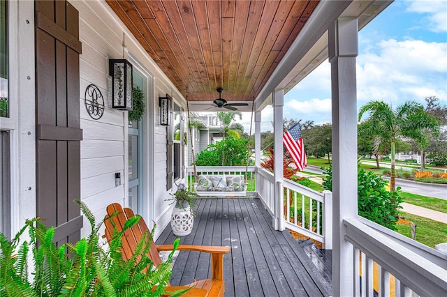 wooden terrace with a porch