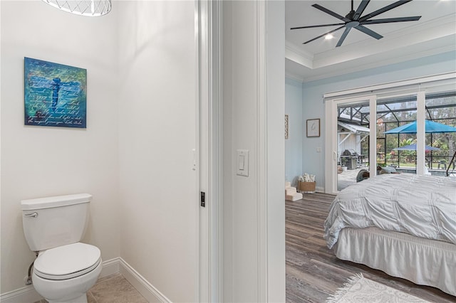 bedroom featuring access to exterior, crown molding, recessed lighting, wood finished floors, and baseboards