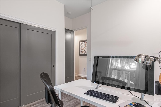 office space featuring wood finished floors