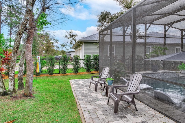 view of yard with a patio area and a lanai