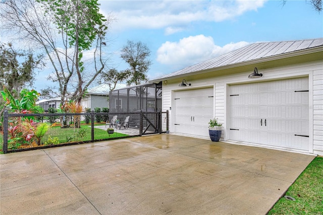 garage featuring fence