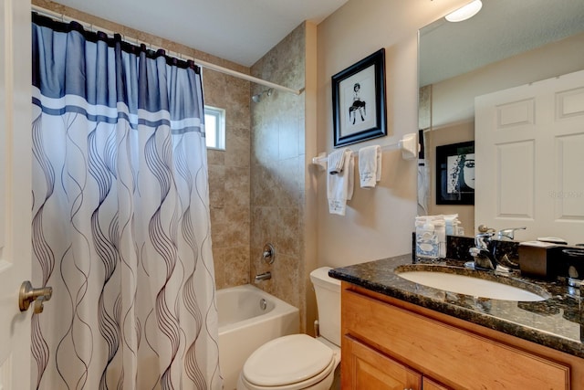 full bathroom featuring toilet, shower / bath combo, and vanity