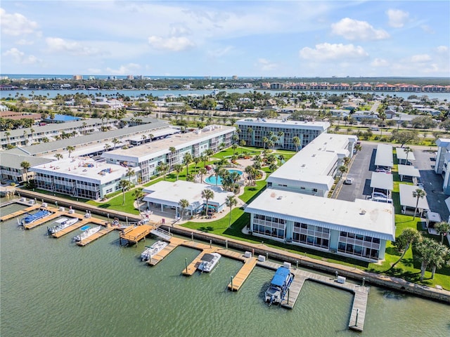 birds eye view of property featuring a water view