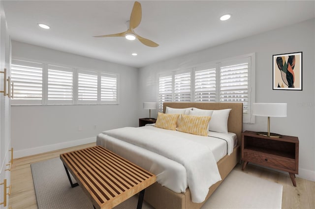 325 N Causeway Unit B101, New Smyrna Beach, FL 32169 - bedroom with light wood finished floors, recessed lighting, and ceiling fan