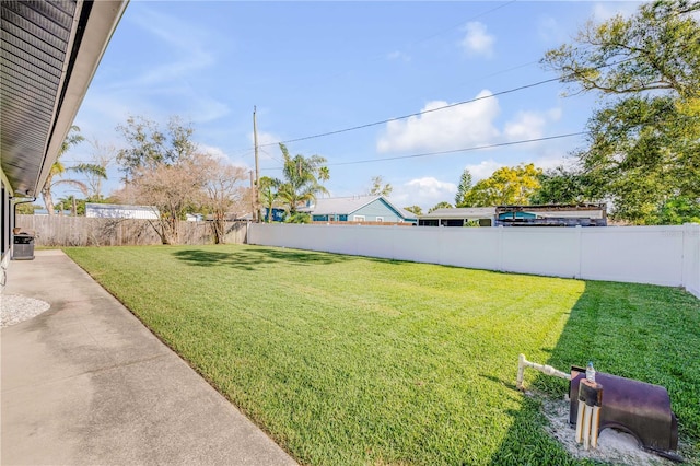 view of yard featuring a fenced backyard