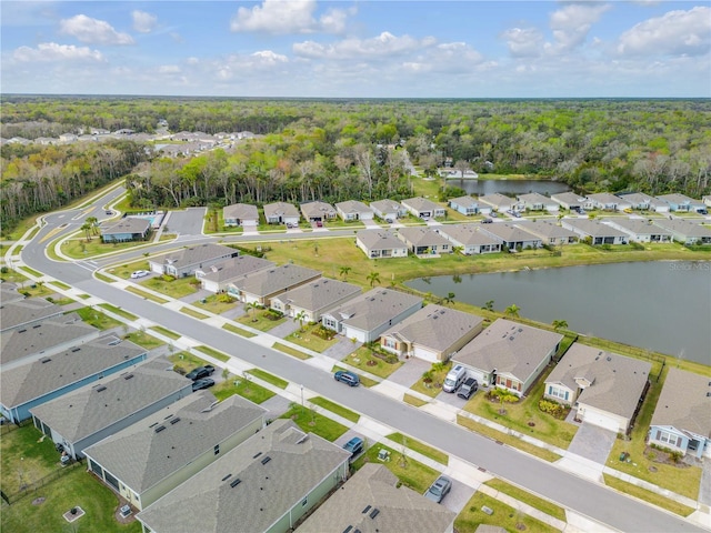 bird's eye view featuring a residential view and a water view