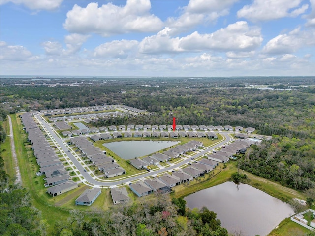 bird's eye view featuring a water view and a residential view