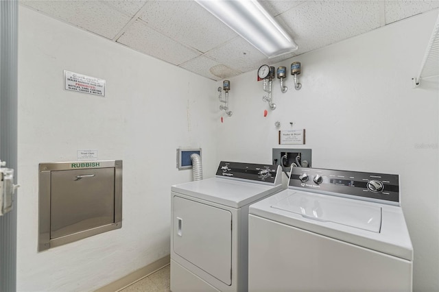 washroom with laundry area and separate washer and dryer