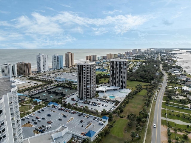 bird's eye view featuring a view of city and a water view