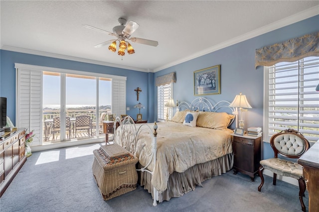 carpeted bedroom with access to exterior, ornamental molding, and a ceiling fan