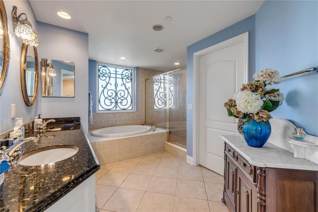 full bath with recessed lighting, a shower stall, a bath, and tile patterned floors