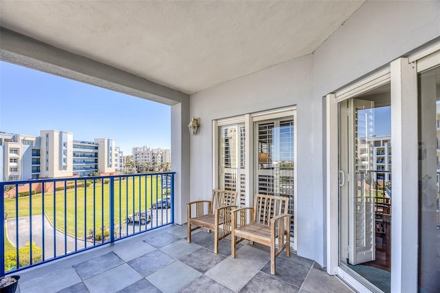 balcony featuring a city view