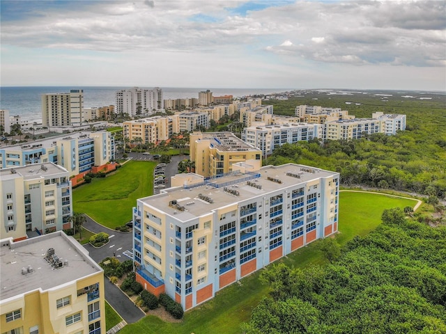 drone / aerial view with a water view and a city view