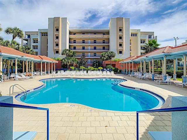 community pool with a patio