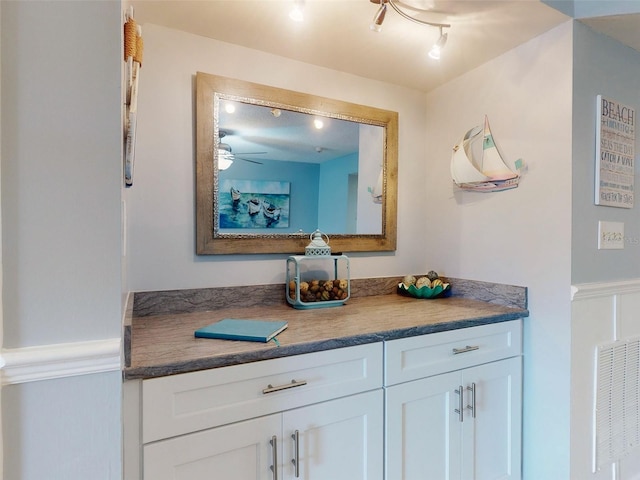 bathroom featuring vanity and visible vents