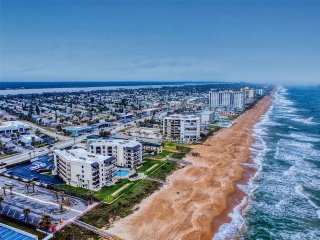 bird's eye view featuring a water view and a city view