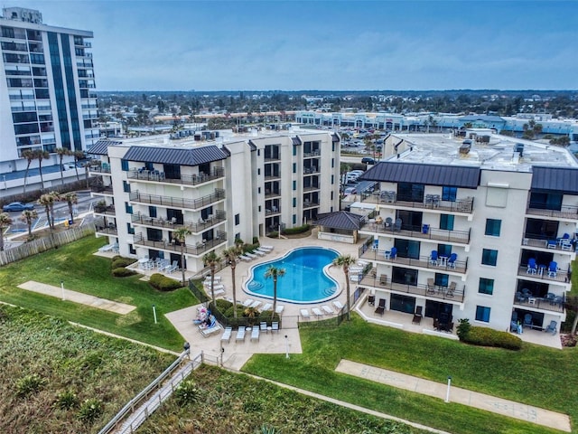 birds eye view of property featuring a view of city