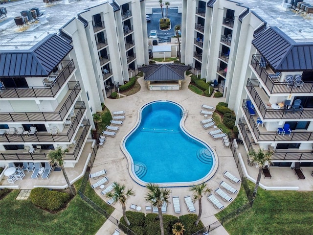 community pool with a patio