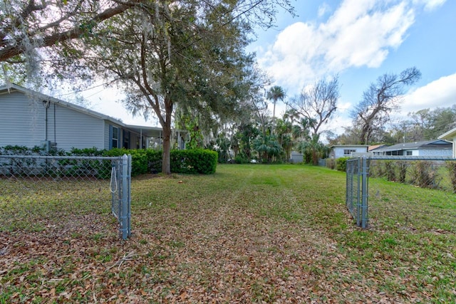 view of yard featuring fence