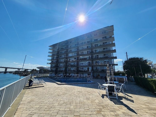 exterior space featuring a community pool