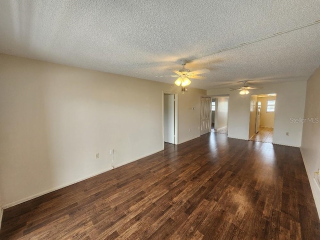 101 N Riverside Dr Unit 2090, New Smyrna Beach, FL 32168 - unfurnished room with wood finished floors, a textured ceiling, and a ceiling fan