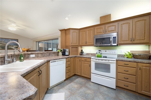 2576 Shilo Glynn Ln, New Smyrna Beach, FL 32168 - kitchen featuring white appliances, a sink, vaulted ceiling, ceiling fan, and light tile patterned floors
