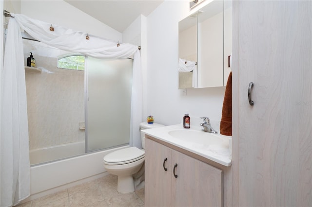 2576 Shilo Glynn Ln, New Smyrna Beach, FL 32168 - full bath with vanity, enclosed tub / shower combo, toilet, lofted ceiling, and tile patterned floors
