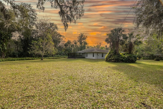 2576 Shilo Glynn Ln, New Smyrna Beach, FL 32168 - yard at dusk with a yard
