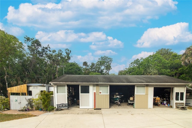 2576 Shilo Glynn Ln, New Smyrna Beach, FL 32168 - view of front of house featuring a garage and an outdoor structure