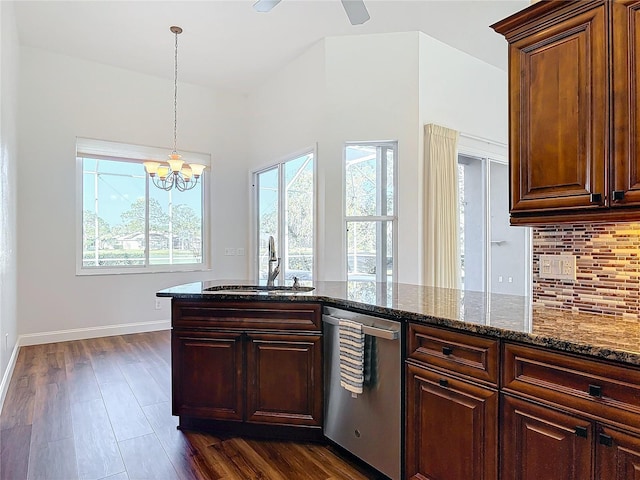 6456 Cypress Springs Pkwy, Port Orange, FL 32128 - kitchen featuring tasteful backsplash, a sink, dark wood-style floors, and stainless steel dishwasher
