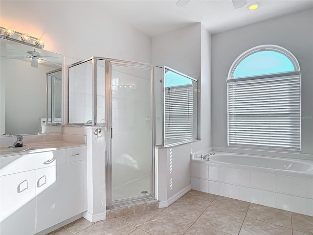 6456 Cypress Springs Pkwy, Port Orange, FL 32128 - full bath with vanity, tile patterned floors, a stall shower, and ceiling fan