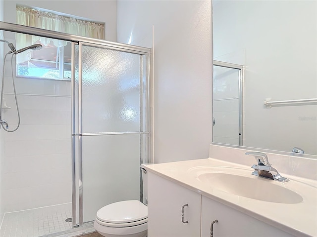 6456 Cypress Springs Pkwy, Port Orange, FL 32128 - bathroom featuring a stall shower, toilet, and vanity