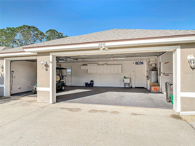 6456 Cypress Springs Pkwy, Port Orange, FL 32128 - garage with water heater and driveway