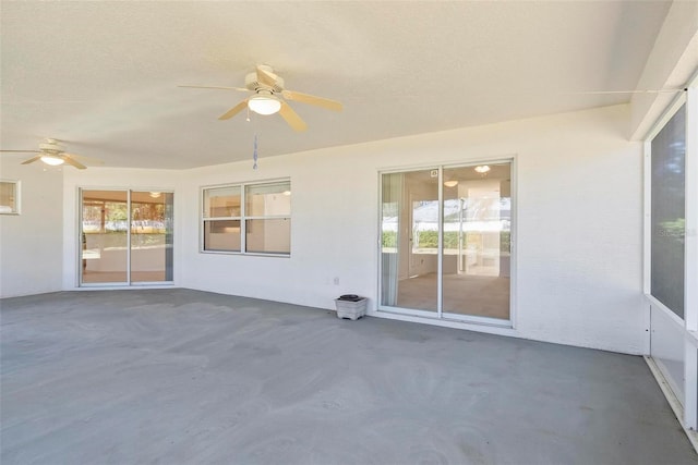 view of patio / terrace featuring ceiling fan