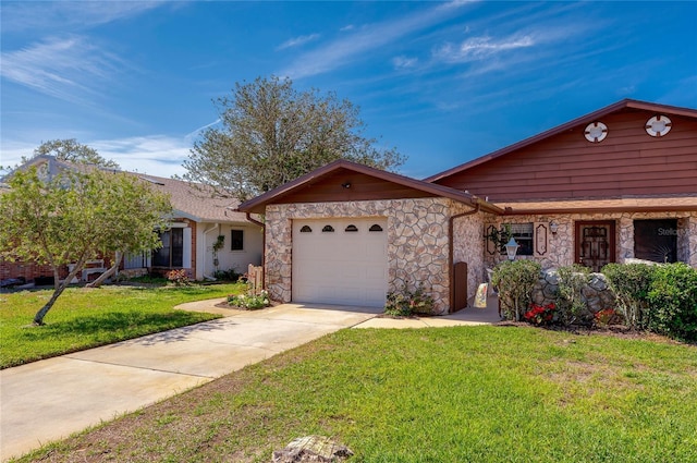 ranch-style house with a garage, concrete driveway, and a front yard