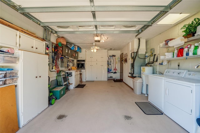 garage featuring washer and clothes dryer and a garage door opener